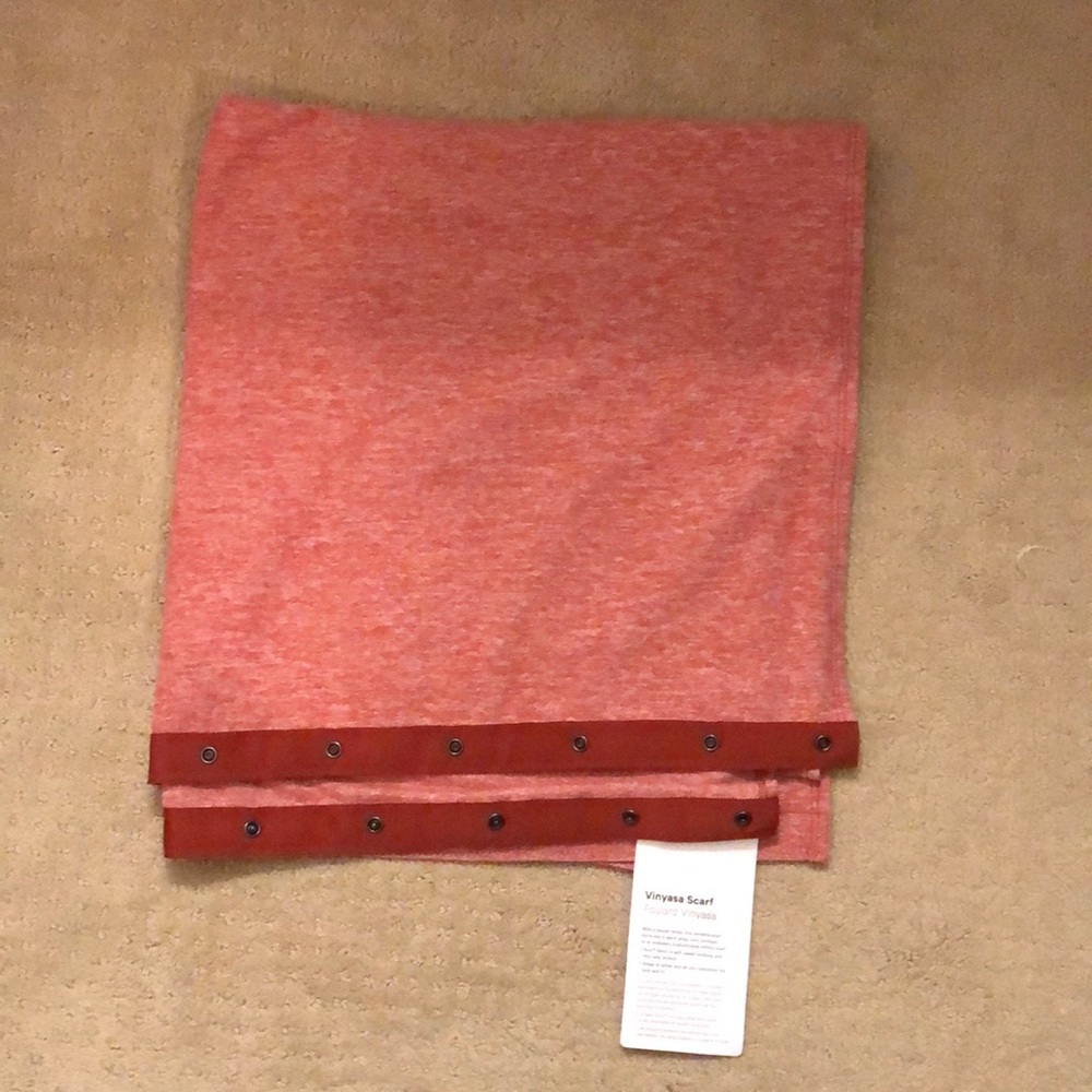 lululemon vinyasa scarf in light red/rust color